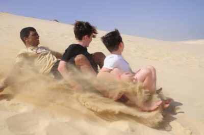 Sandboarding Adrenaline down the big Dunes